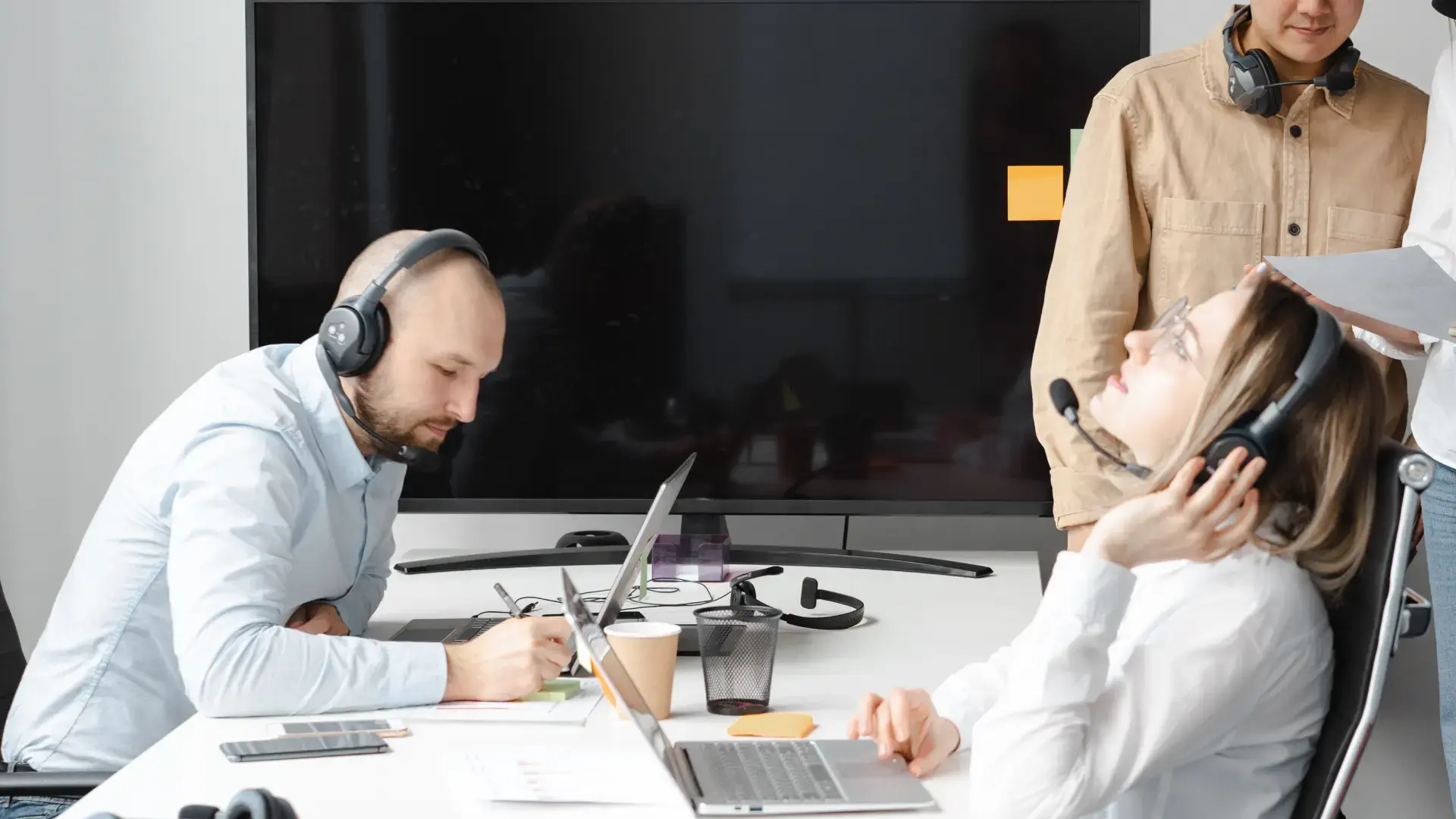 Two call centre agents in an office